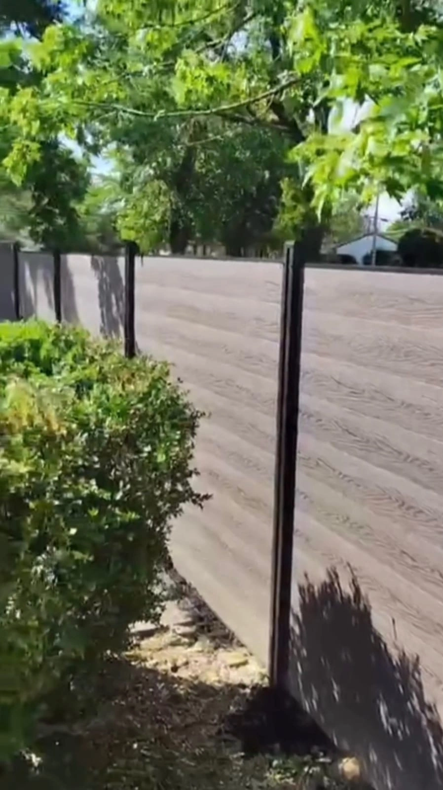 Horizontal privacy fence panels with dark posts